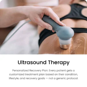 Physiotherapist performing ultrasound therapy on patient’s lower back